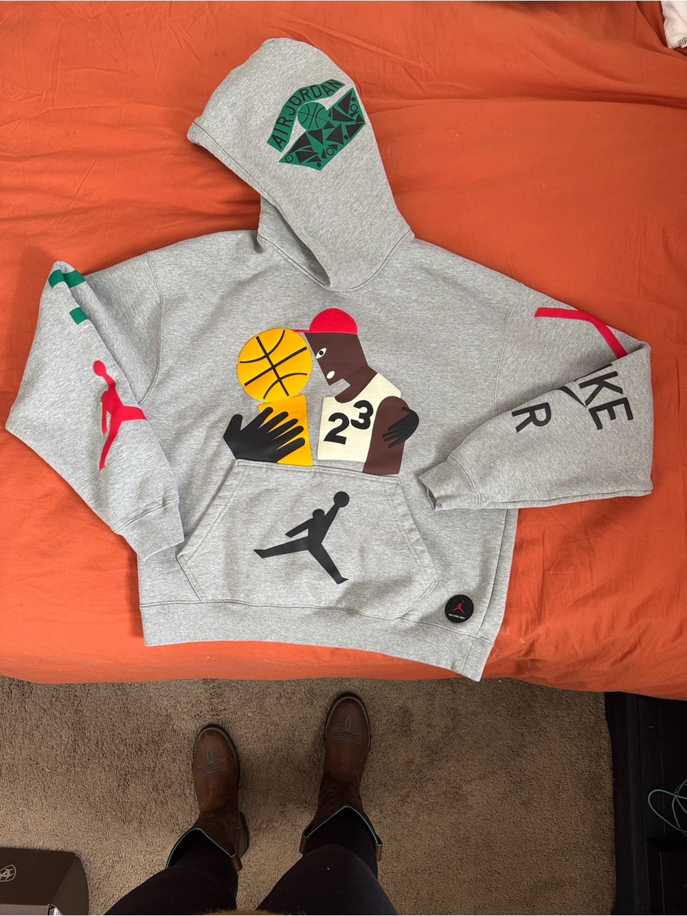 Nike Gray Kids' Hoodie with Multicolor Basketball Graphic